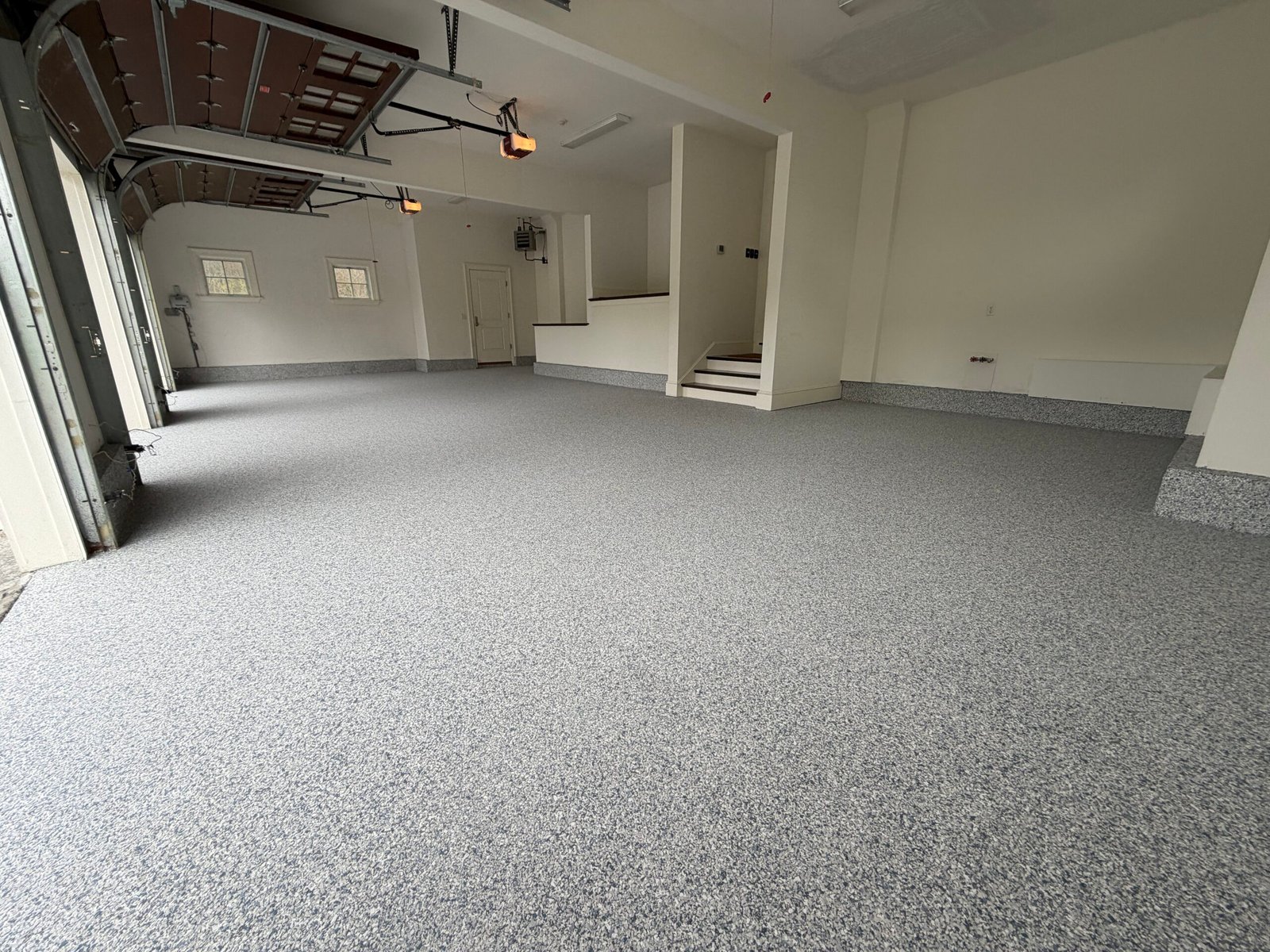 Belmont MA epoxy flake garage floor installed by ART 7 EPOXY